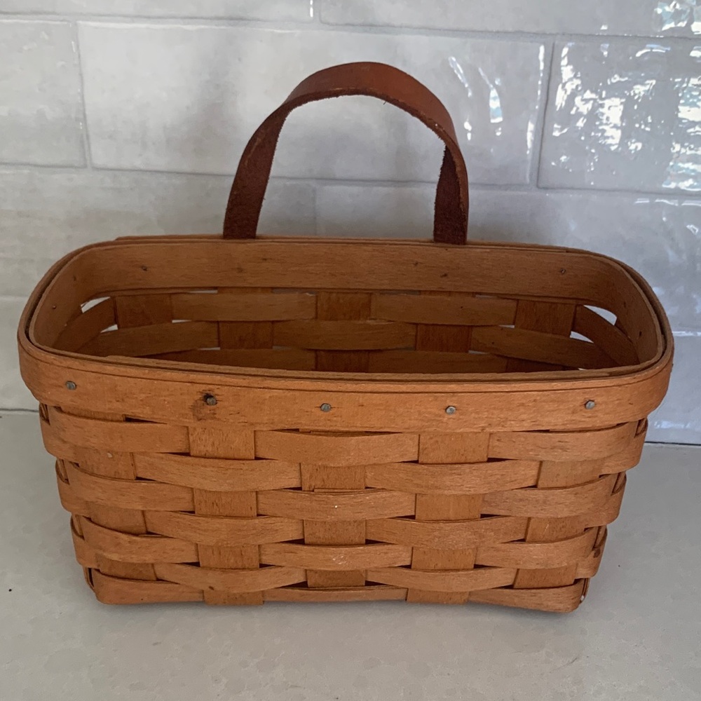 Longaberger woven key mail basket with hangers dated 1989 with hangers